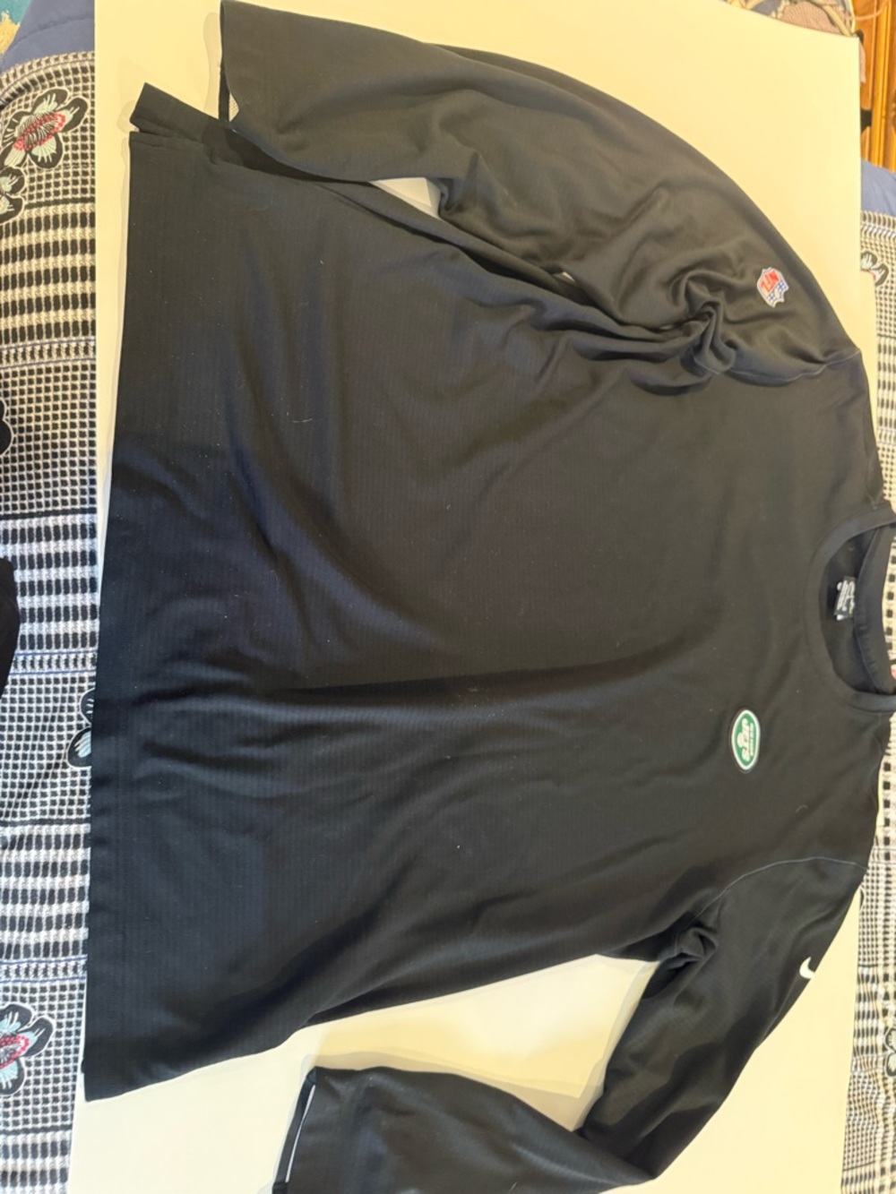 JETS long sleeve black Nike logo tee shirt.